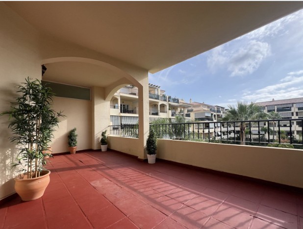 Spacious Apartment With A Private Garden In Mijas